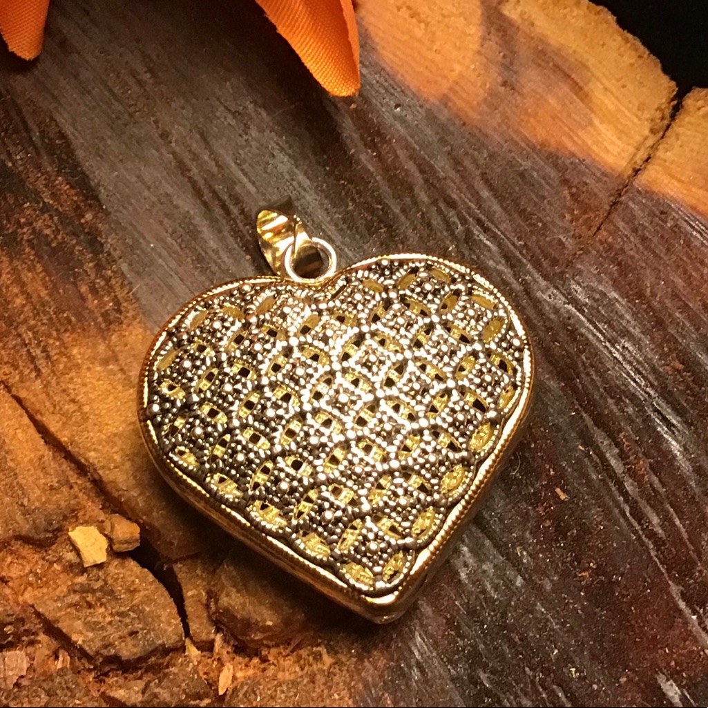 Gold And Silvertone Puffed Heart Pendant 8$